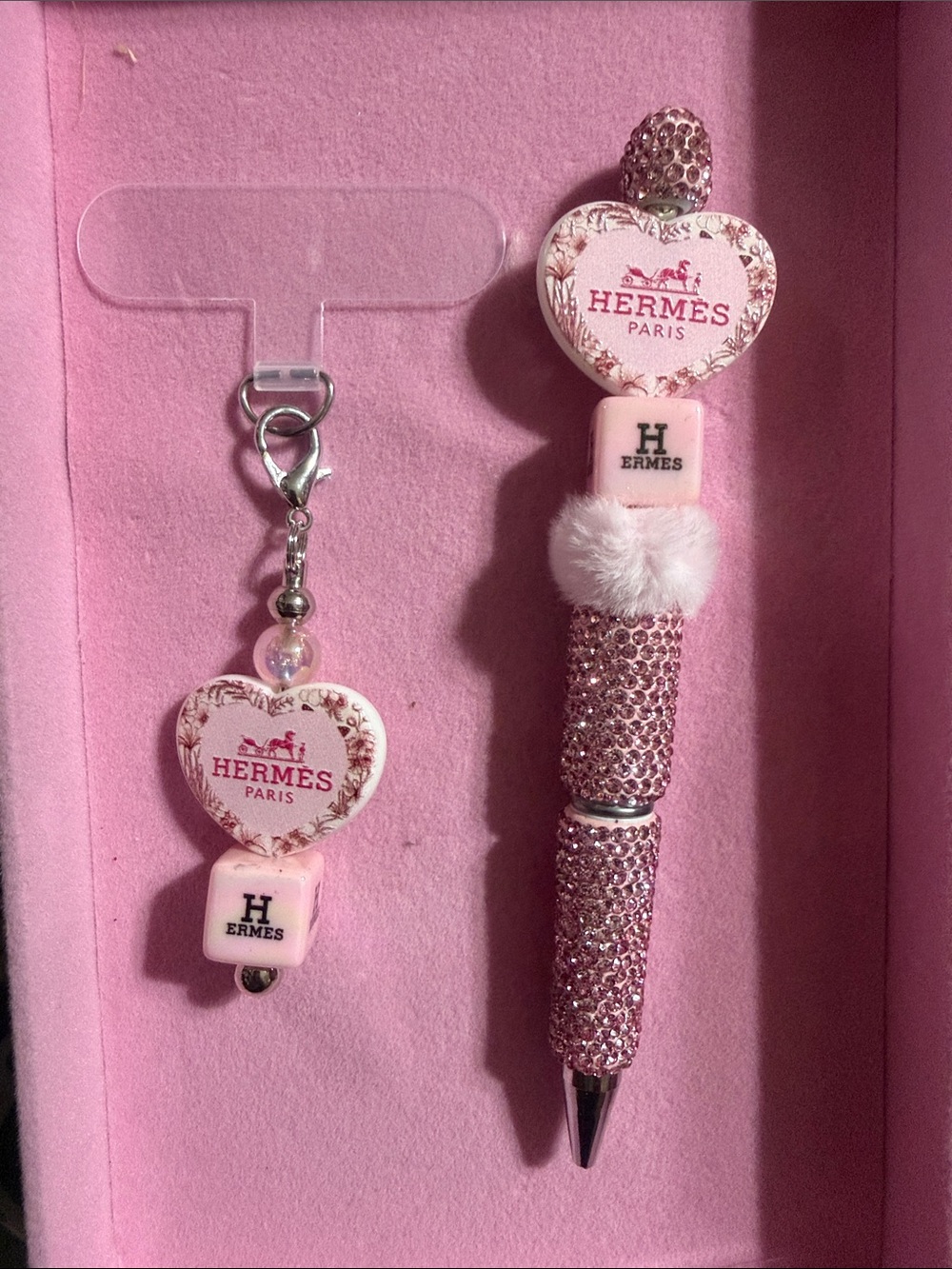 Pink rhinestone pen and matching phone charm w/attachment.